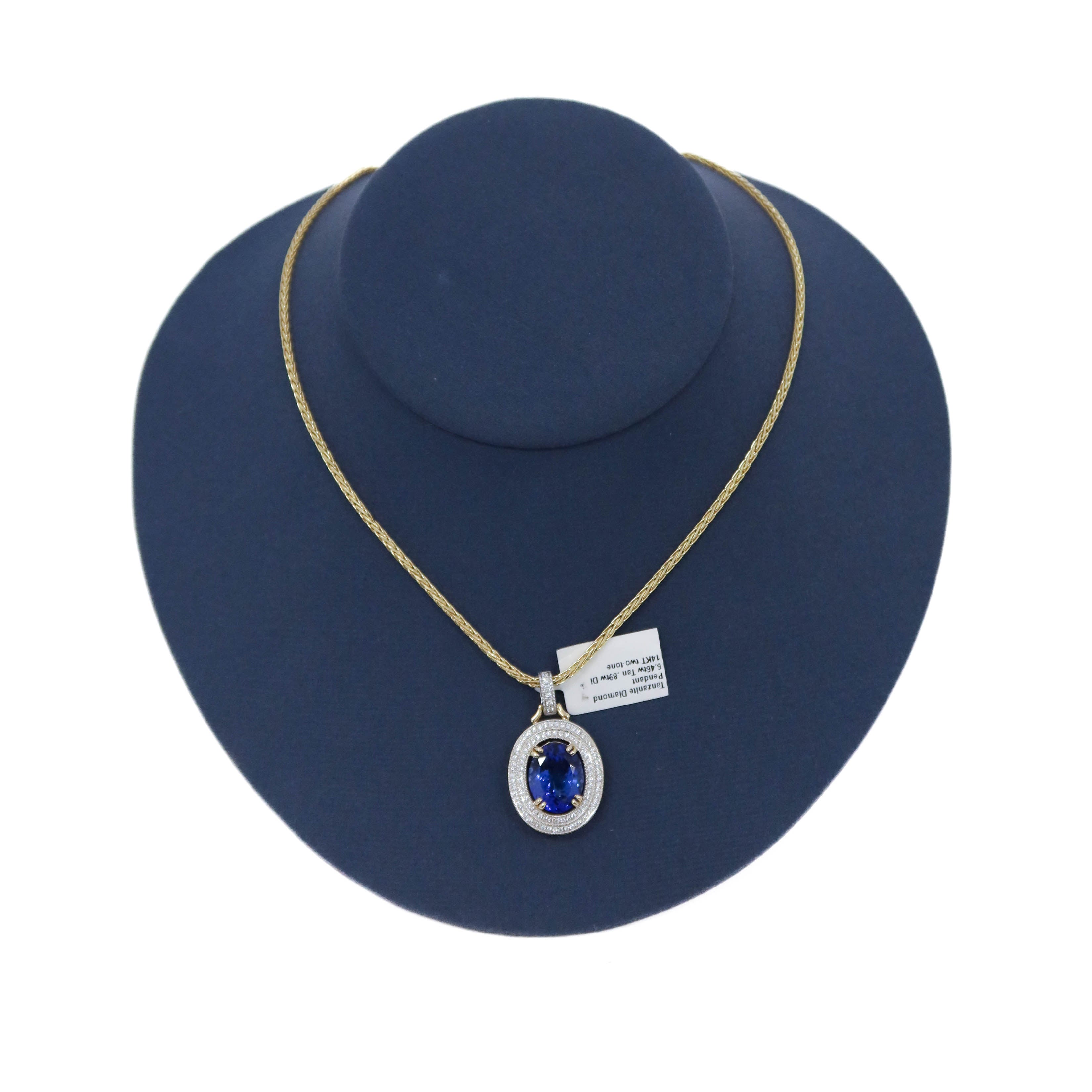 Two Tone Oval Tanzanite and Halo Diamond Pendant